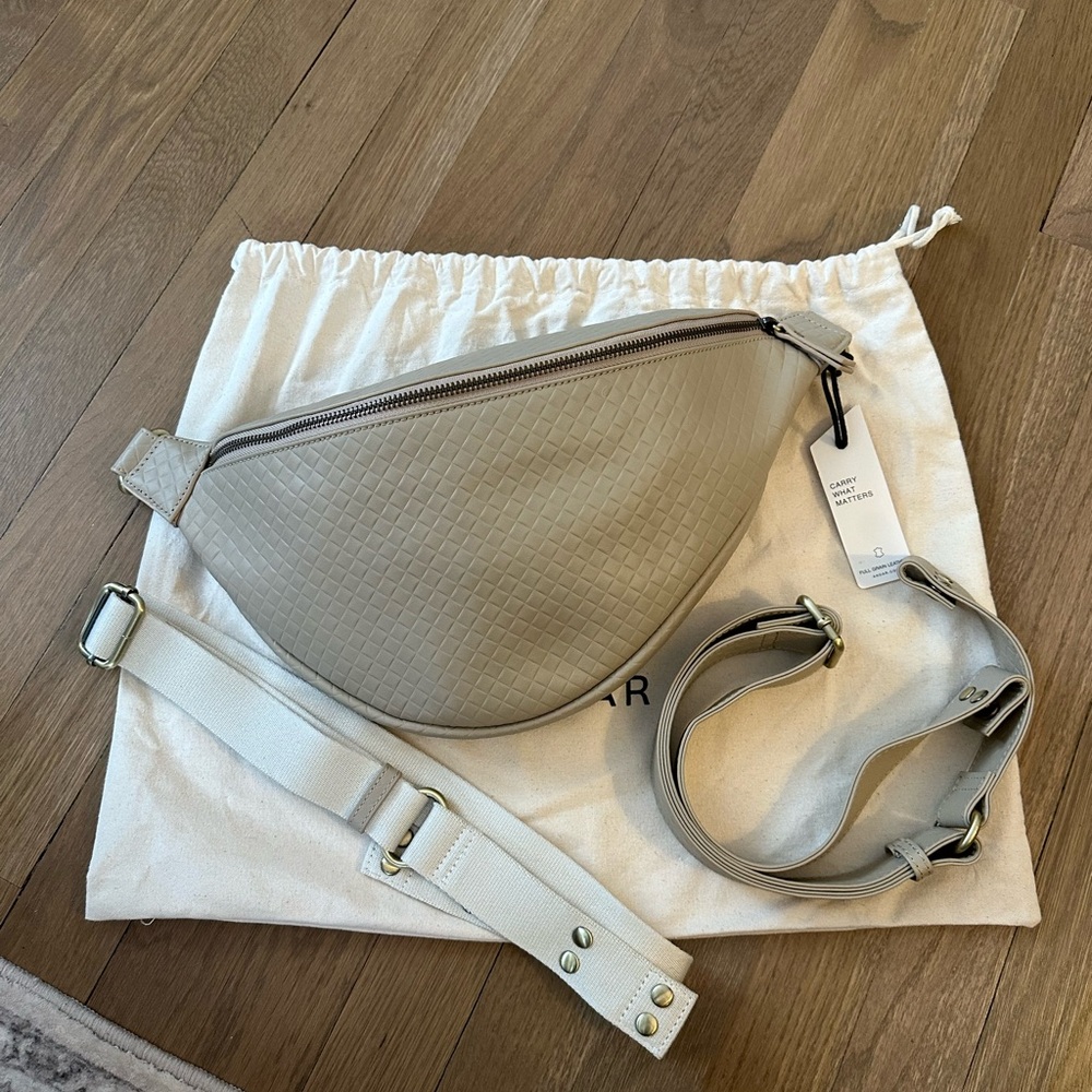 Andar Tatum Crema weave Crossbody Bag
Included extra strap